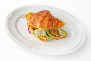 Vegetarian mini sandwich with cheese, tomato, cucumber, zucchini. Beautifully decorated catering banquet menu. Food snacks and appetizers for buffet. Isolated on white background
