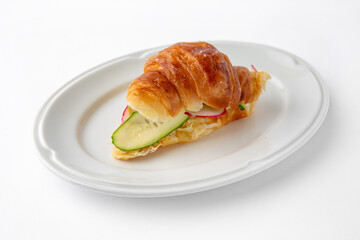 Vegetarian mini sandwich with cheese, tomato, cucumber, zucchini. Beautifully decorated catering banquet menu. Food snacks and appetizers for buffet. Isolated on white background