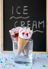 Ice cream in cones with colorful sprinkles
