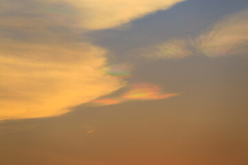 Iridescent pileus cloud,Sky at sunset,Twilight sky after sunset