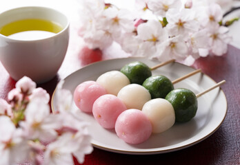 Sanshoku dango and green tea. An image of Japanese spring