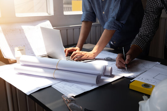 Meeting Man engineering architects at the office.