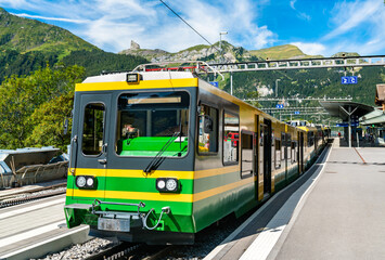 Fototapeta premium Rack train in Wengen above the Lauterbrunnen Valley, Switzerland