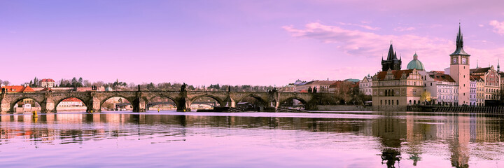 Fototapeta na wymiar Prague, Charles bridge reflected in Vltava river