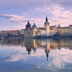 Fototapeta na wymiar Charles Bridge and Historical buildings in Prague wth reflection