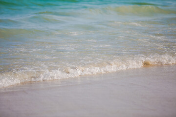 waves on the beach, The sea water in Thailand is crystal clear.