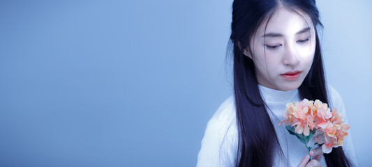 Naklejka premium Portrait of Asian girl has broken heart in autumn winter