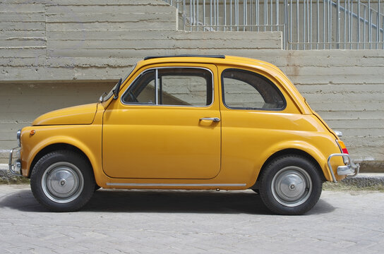 Enna, Italy - April 19, 2014: a vintage Fiat 500 parked in the City of Enna. The Cinquecento was a city car produced by the Italian manufacturer Fiat between 1957 and 1975. 