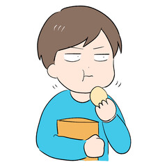 お菓子を食べている男性