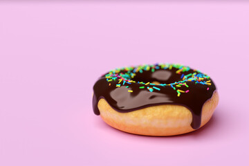 3d illustration of realistic chocolate  appetizing donut  with sprinkles on pink background. Simple modern design. Realistic  illustration.