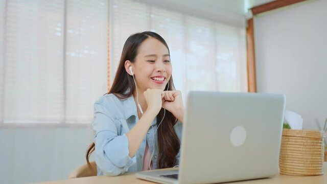 Asian student feeling extremely happy to get pass entrance examination
