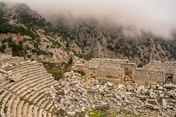 Fototapeta na wymiar Scenic view of theater of Termessos, which was a Pisidian city built at an altitude of more than 1000 metres at the south-west side of the mountain Solymos (Güllük Dağı) in Taurus Mountains, Antalya