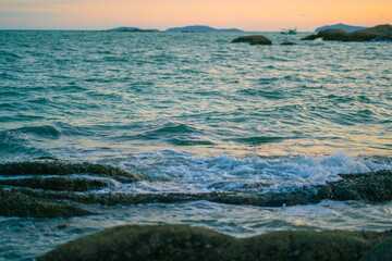 Naklejka premium Sunset atmosphere at Phayun Beach Which is a tourist attraction in Rayong Province, Thailand Had Phayun in the evening, people often come out to relax.