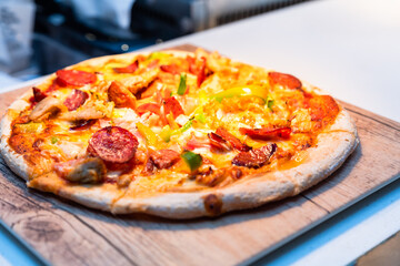 Fresh Rustic Pizza on a wooden board 