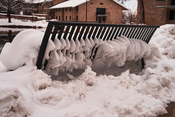 Snow on a bench. March 15, 2021 