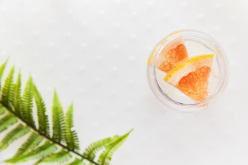 Homemade summer cocktail. Hard seltzer with grapefruit and lemon. Summer background. Top view, copy space