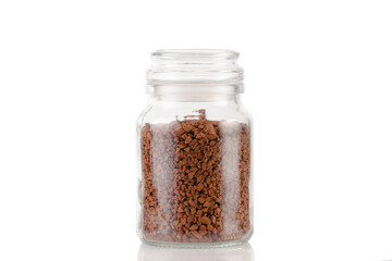 Fragrant coffee is poured into a glass jar.