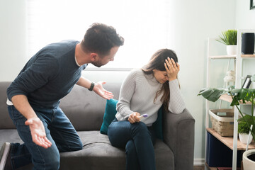 Obraz premium Couple fighting because they don't want a baby