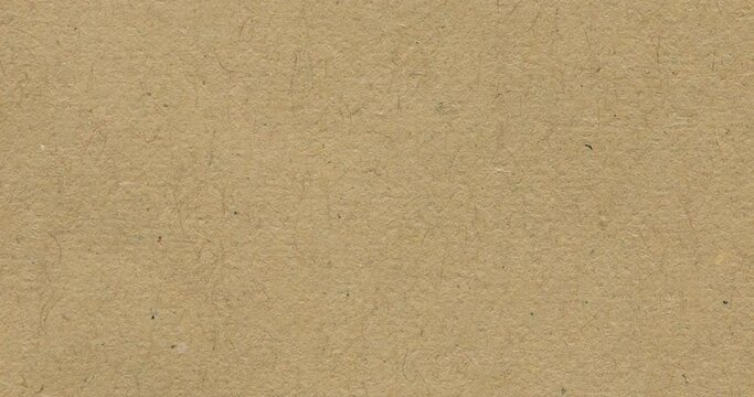 cardboard Paper Texture Stop motion graphic animated background , 4K blank endless beige background. Background for titles or credits.