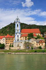 Fototapeta na wymiar blue church on the Danube River in Austria 
