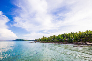 Summer sea beach white sand against blue sky with cloud