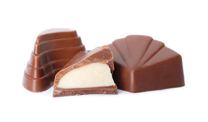 Tasty chocolate candies on white background