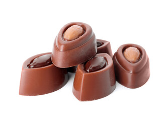 Tasty chocolate candies on white background