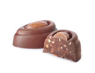 Tasty chocolate candies on white background