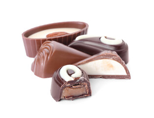 Tasty chocolate candies on white background