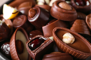 Tasty chocolate candies as background