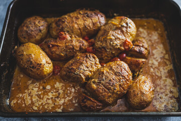 vegan baked potato with spicy creamy sauce made with dairy-free cream, healthy plant-based food