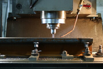 Drilling machine in manufacturing facility