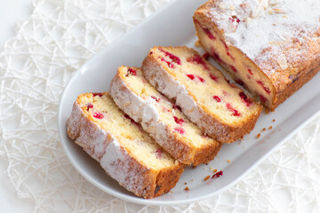 Freshly sliced baked cake on a plate.