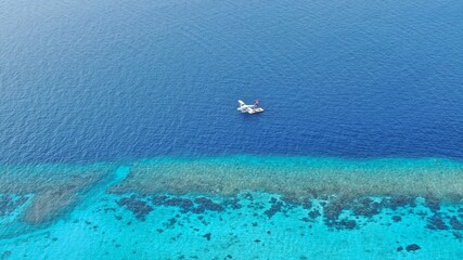 Waterplane on the ocean close to the reef