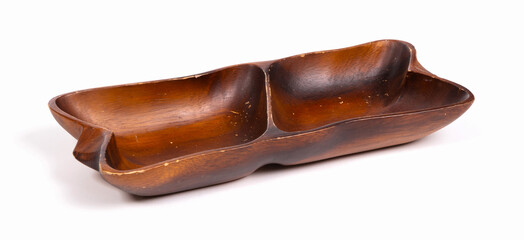 Old handmade carved wooden bowl isolated