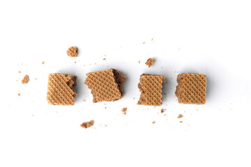 Chocolate wafers with crumbs isolated on white background.