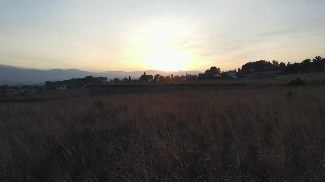 The sun is setting on the horizon