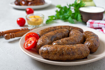 Homemade buckwheat sausages on a plate. Vegetarian menu.