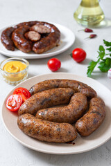 Meat sausages and alternative vegetarian buckwheat sausages.