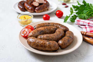 Meat sausages and alternative vegetarian buckwheat sausages.
