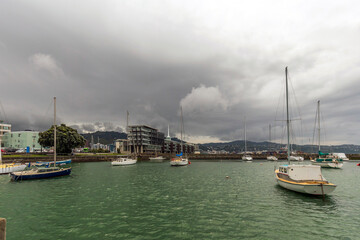 Wellington, New Zealand - December 01, 2019: Sail boats in the marina at Oriental Bay in Wellington, New Zealand