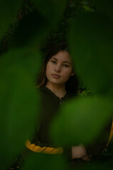 portrait of a girl in a forest