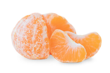 Tangerine without peel and its slices isolated on a white background