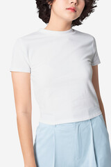 Fototapeta premium Beautiful woman in basic white t-shirt with design space