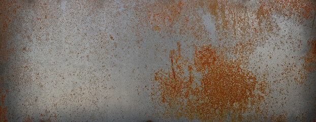rusty silver flat surface of iron with orange tones - worn steampunk background with scratches for...