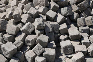 pile with stone cubes used as a bricks