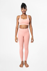 Woman in pink sports bra and leggings set
