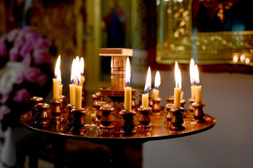 burning candles in church