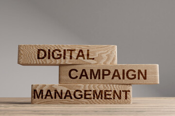 Digital campaign management wooden blocks balance concept