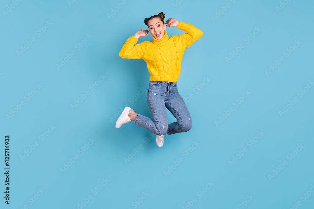 Sticker Full size photo of cheerful carefree person jumping hands checking hair isolated on blue color background